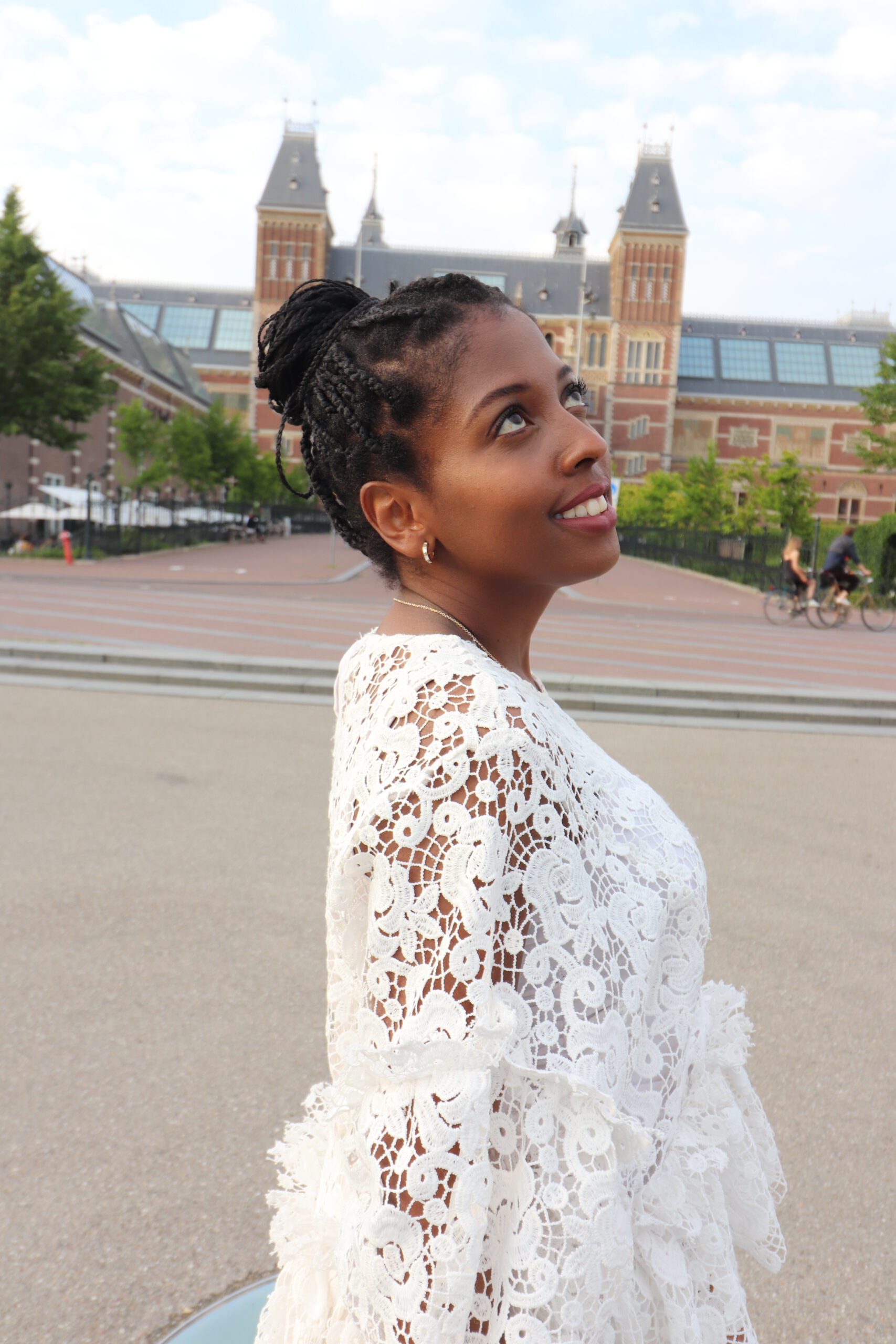 head shot, black girl, rijksmuseum, amsterdam, city center, white, lace, blouse, black hair, braids, box braids, change, vision, smile, transition