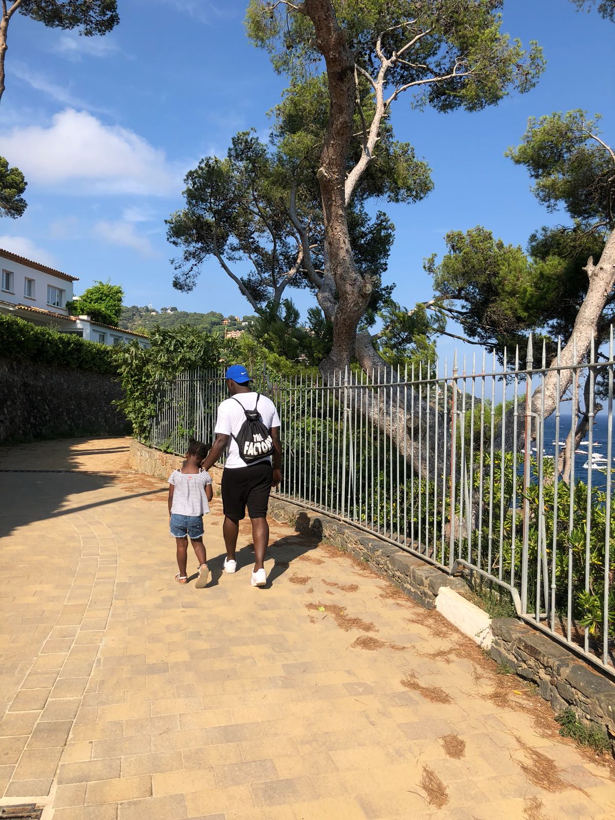 Calella de Palafrugell, Girona, Spain, child and father, walking, ocean view